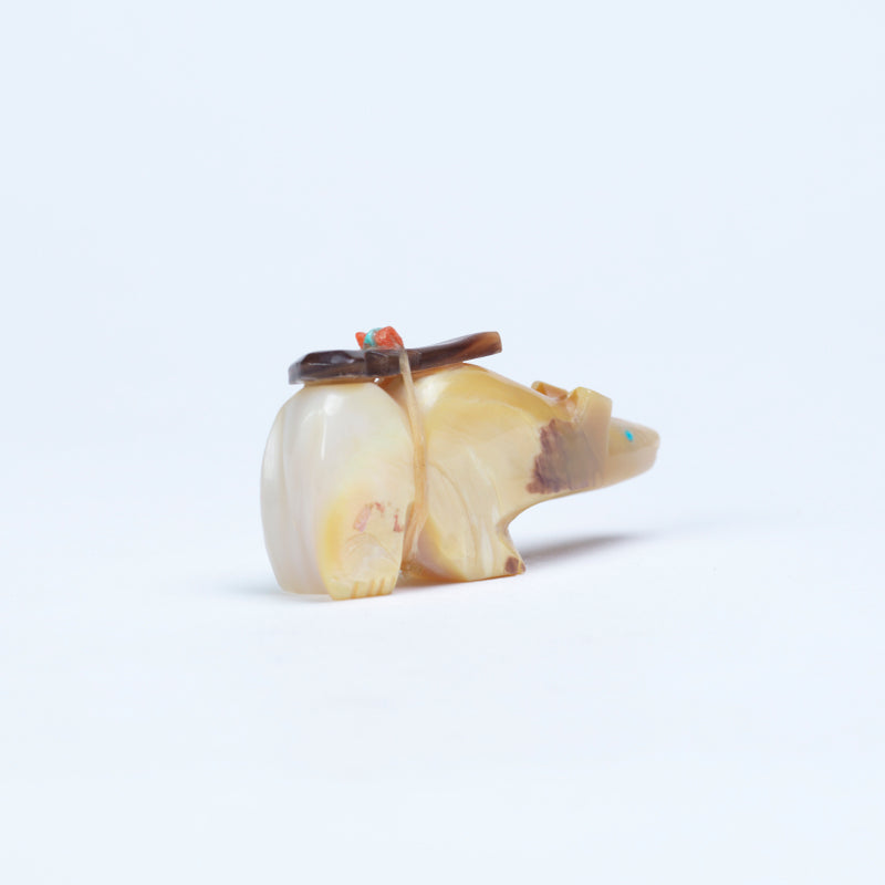 Kyle Mahooty (d): Gold lip shell, Bear with offering