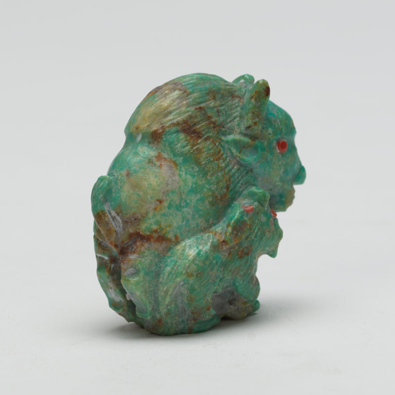 Derrick Kaamasee: Turquoise Bison with Coyote