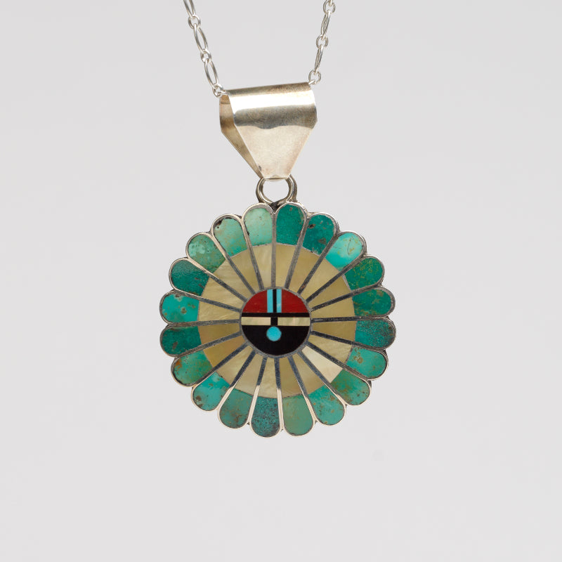 April Unkestine: Silver Inlayed Sunface Pendant