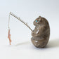Christopher Gchachu: Petoskey, Standing Bear with Fishing pole