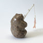 Christopher Gchachu: Petoskey, Standing Bear with Fishing pole