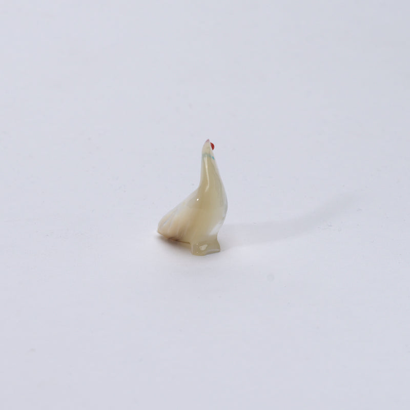Calvert Bowannie: Mother Of Pearl, Raven with Coral Ball