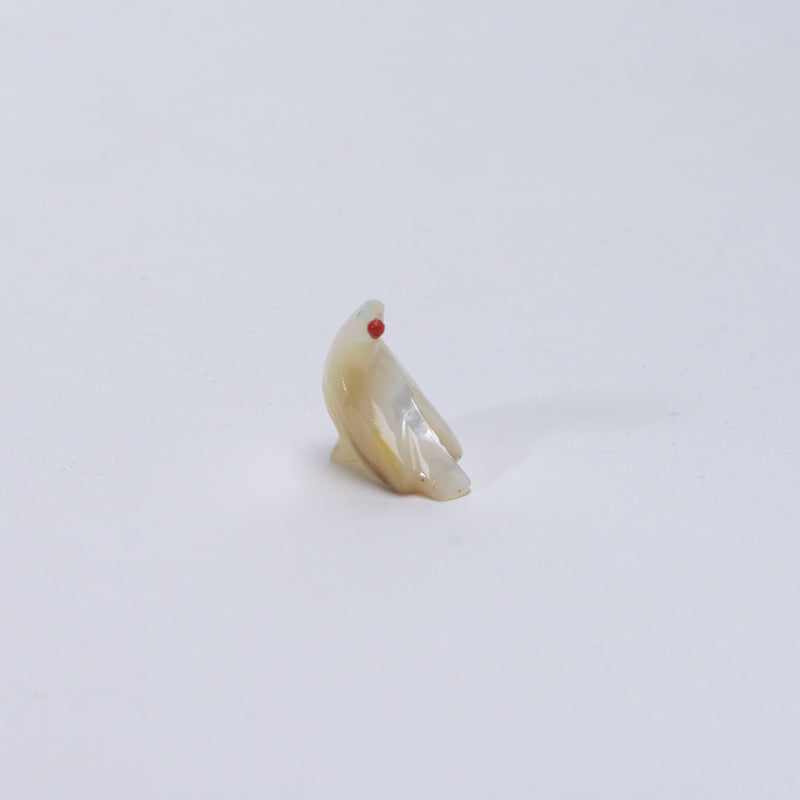 Calvert Bowannie: Mother Of Pearl, Raven with Coral Ball
